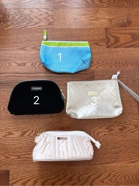 Brand new Lot of 4 Cosmetic Makeup Bags - Blue, Black, Golden, Cream